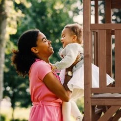 AXI Beach Tower Speeltoestel In Bruin - Speeltoren Met Zandbak En Grijze Glijbaan - FSC Hout - Speelhuis Op Palen Voor De Tuin -Duurzamer-speelgoed Winkel 550x550 278